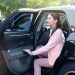 Businesswoman in luxury car