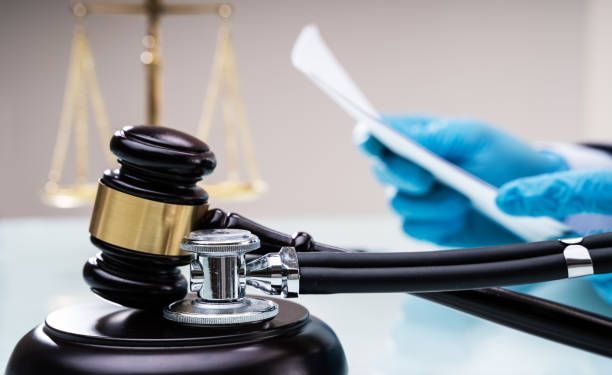 Medical Malpractice Litigation. Lawyer Or Judge In Courtroom