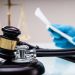 Medical Malpractice Litigation. Lawyer Or Judge In Courtroom